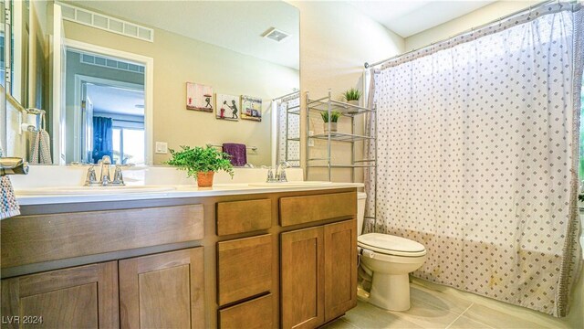 full bathroom with tile patterned floors, vanity, shower / bath combination with curtain, and toilet