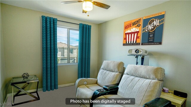 living area featuring ceiling fan