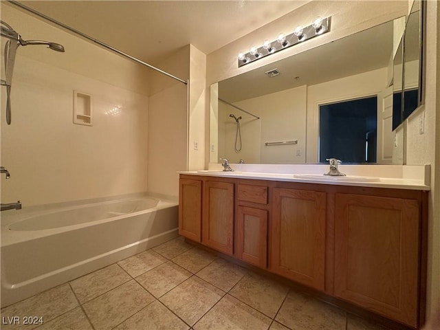 full bath with tile patterned flooring, a sink, and bathing tub / shower combination