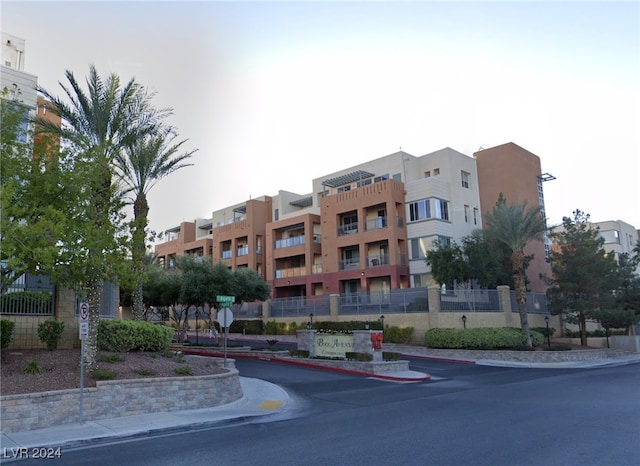 view of building exterior featuring fence