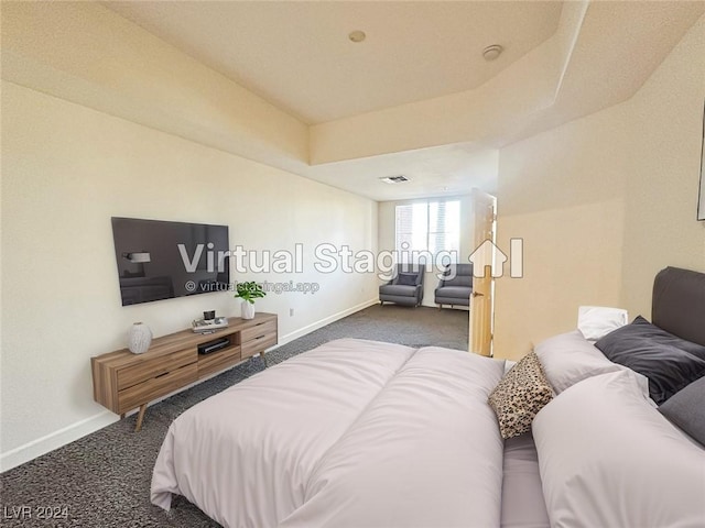 bedroom featuring carpet floors, visible vents, and baseboards