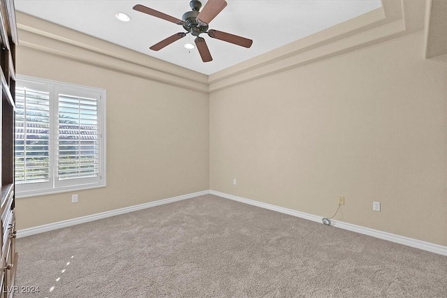 spare room with carpet flooring, baseboards, a ceiling fan, and recessed lighting