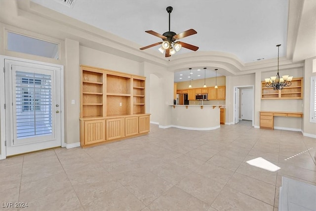 unfurnished living room with light tile patterned floors, a tray ceiling, baseboards, and ceiling fan with notable chandelier