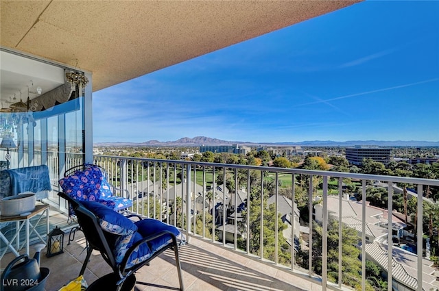 balcony featuring a mountain view