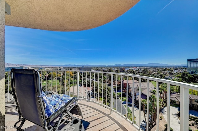 balcony featuring a mountain view