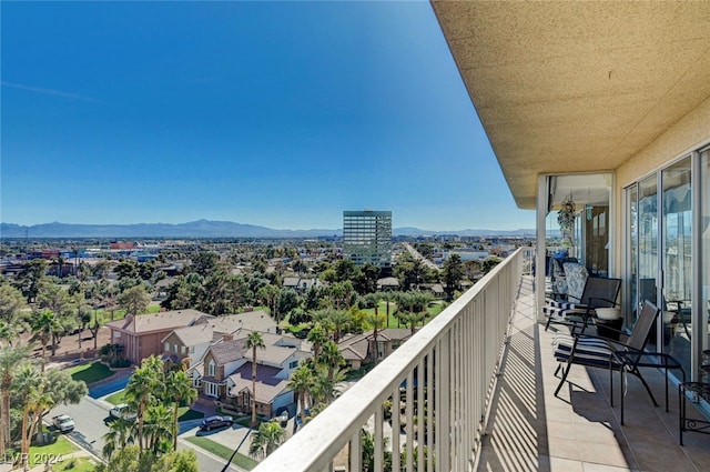 balcony featuring a mountain view