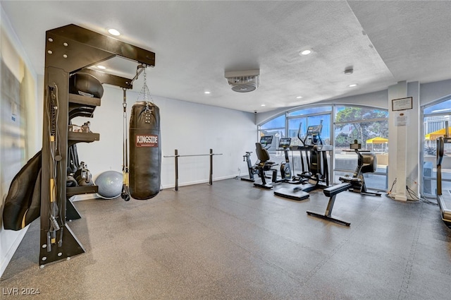 workout area featuring a textured ceiling