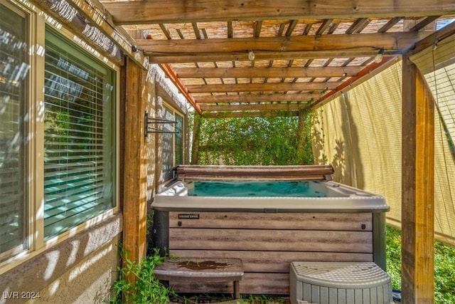 exterior space featuring a jacuzzi