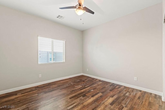 unfurnished room featuring dark hardwood / wood-style flooring and ceiling fan