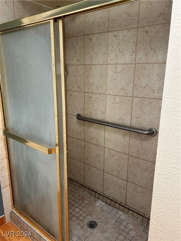 bathroom with an enclosed shower