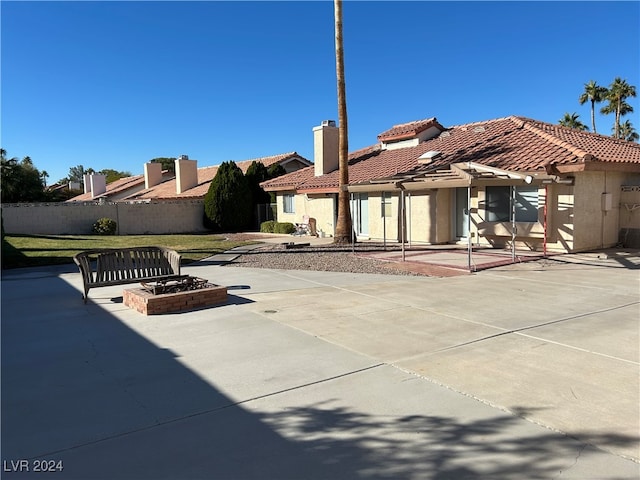 back of property with a patio area