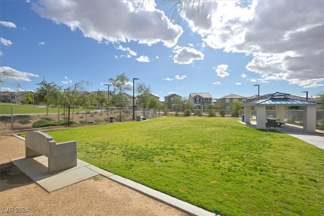 view of property's community featuring a gazebo and a yard