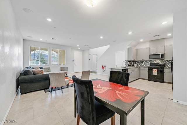 tiled dining area with sink