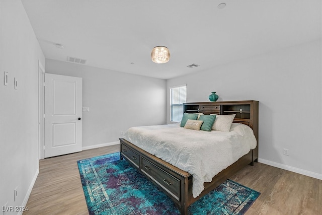 bedroom featuring light hardwood / wood-style floors