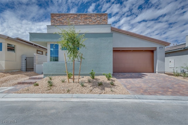 modern home featuring a garage