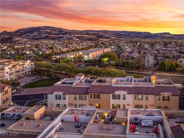 aerial view at dusk with a mountain view