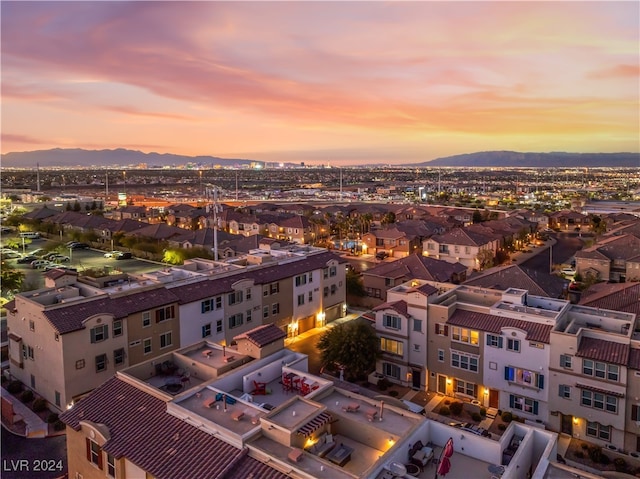 aerial view at dusk with a mountain view