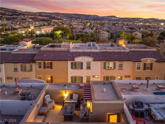 aerial view at dusk with a mountain view