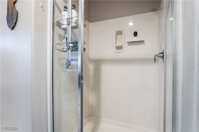 bathroom featuring walk in shower