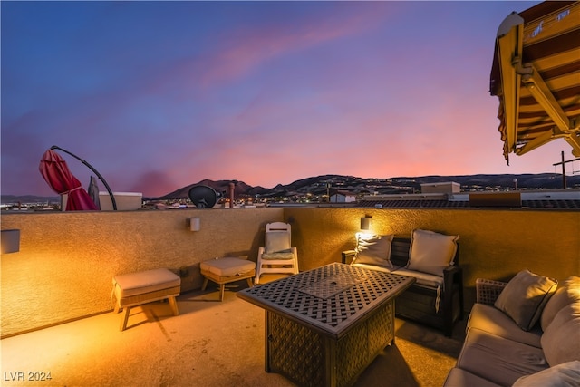 patio terrace at dusk with outdoor lounge area