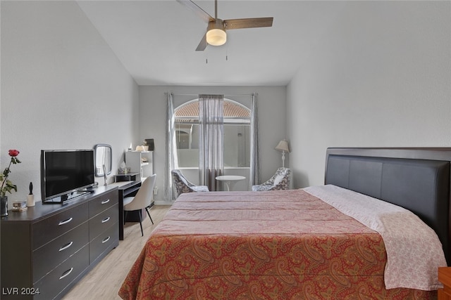 bedroom with ceiling fan and light hardwood / wood-style floors