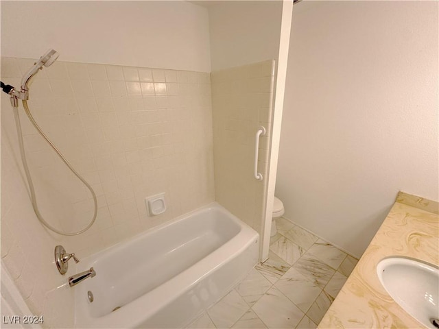 full bathroom with vanity, toilet, and shower / washtub combination