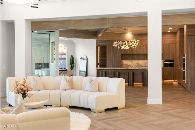 living room with beam ceiling and parquet floors