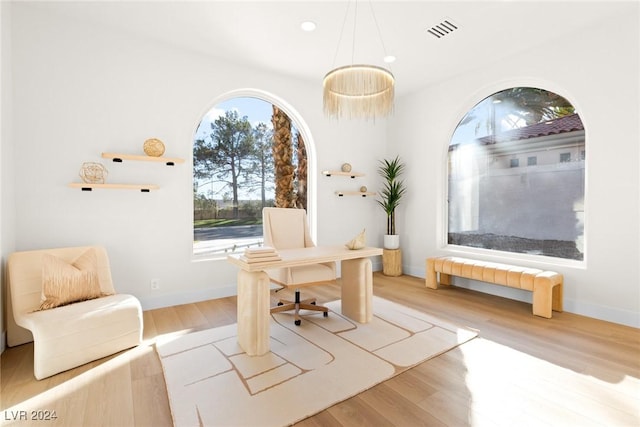 office space featuring light wood-type flooring