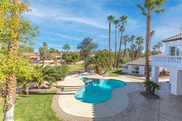 view of swimming pool featuring a patio area, a lawn, and a pergola