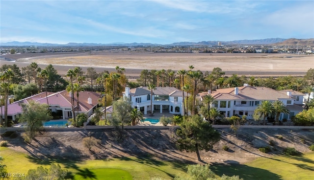 bird's eye view with a mountain view