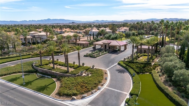 birds eye view of property featuring a mountain view