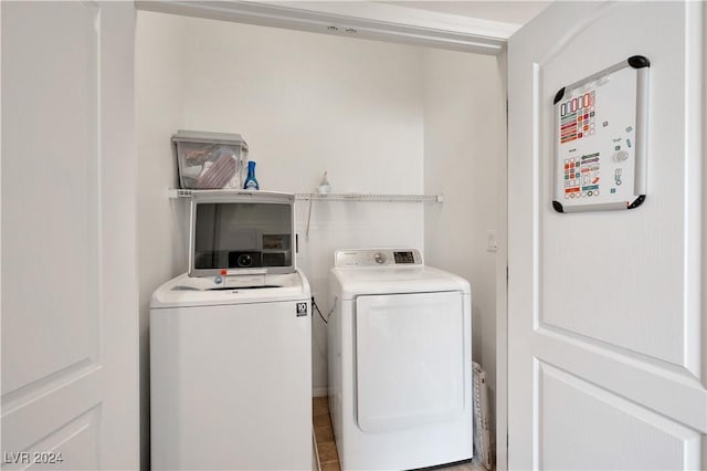 laundry room with washer and dryer