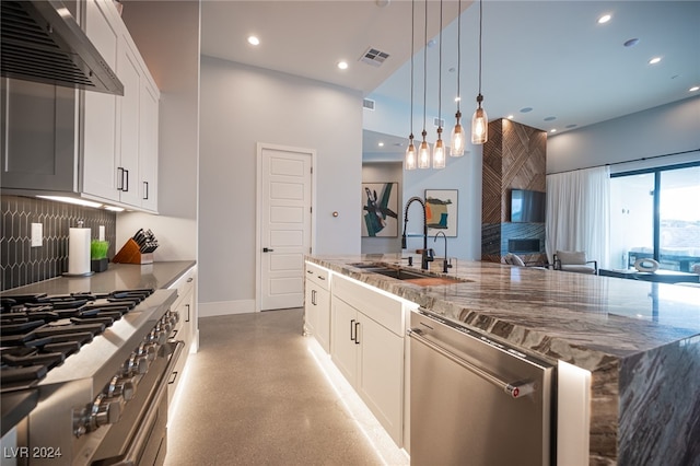 kitchen featuring decorative backsplash, light stone countertops, stainless steel appliances, ventilation hood, and white cabinets