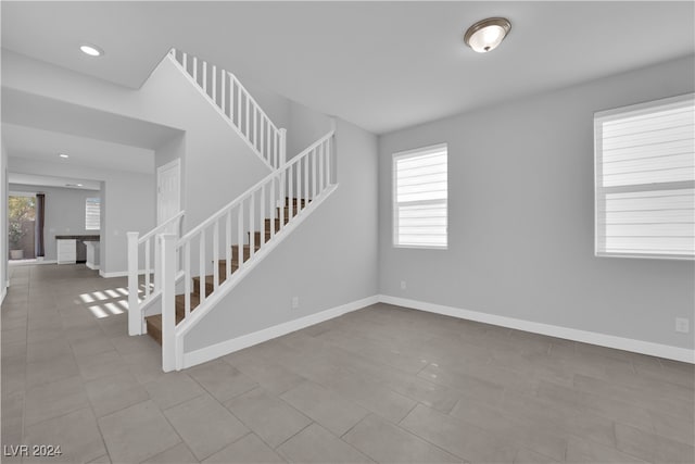 interior space with light tile patterned floors