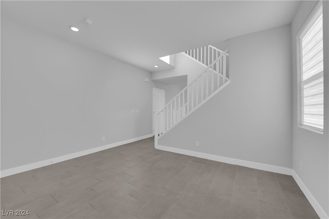 unfurnished living room with a wealth of natural light