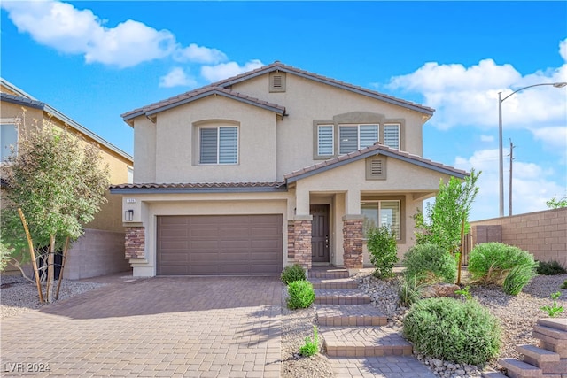 front of property featuring a garage