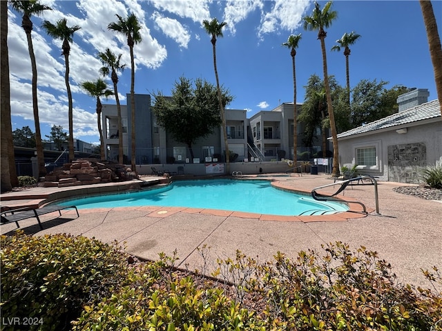 view of pool featuring a patio area