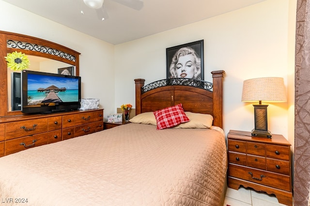 bedroom featuring ceiling fan and light tile patterned floors