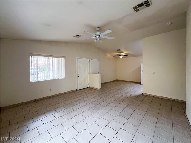 interior space with light tile patterned flooring, ceiling fan, and lofted ceiling