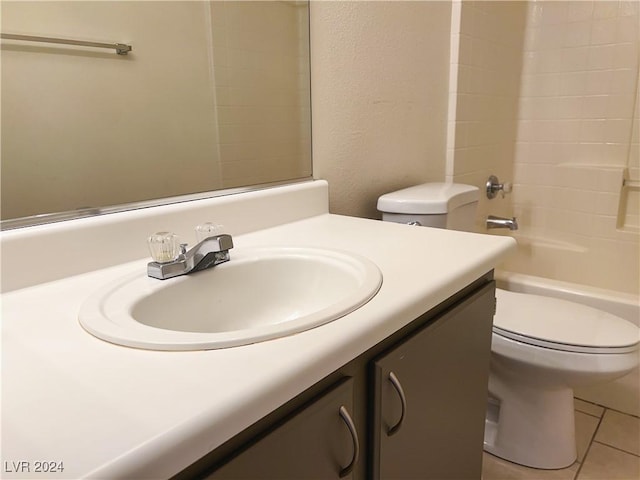 full bathroom with tile patterned flooring, vanity, bathing tub / shower combination, and toilet