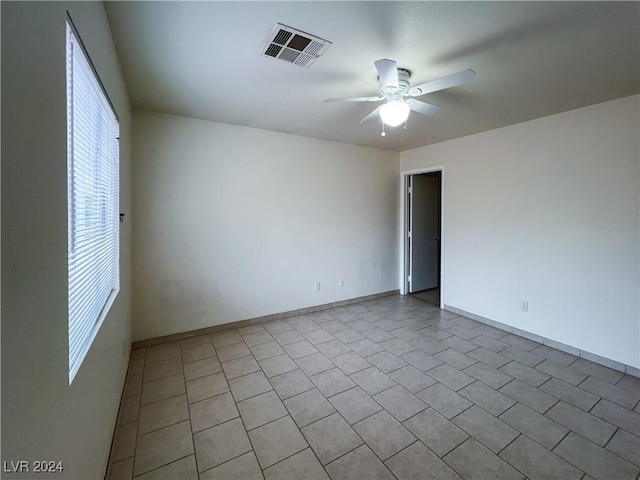 spare room featuring ceiling fan