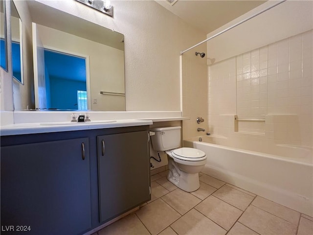 full bathroom featuring vanity,  shower combination, tile patterned floors, and toilet