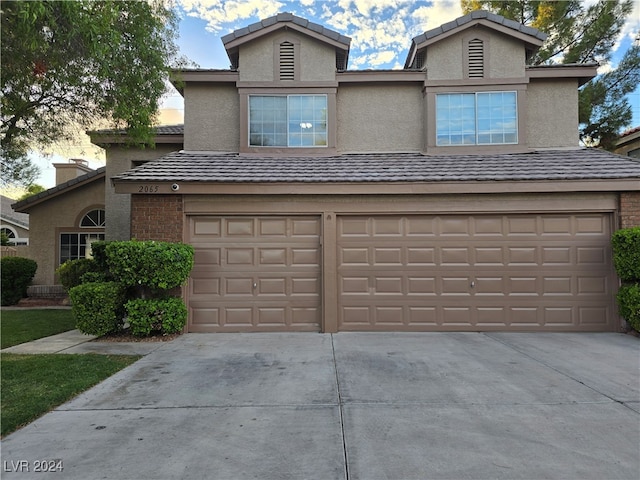 view of property featuring a garage