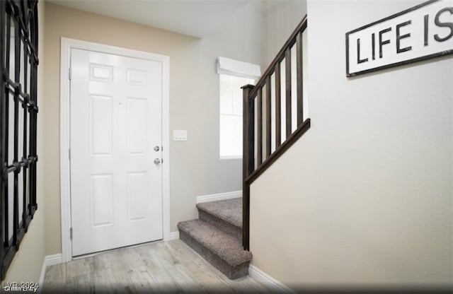 foyer with light hardwood / wood-style flooring