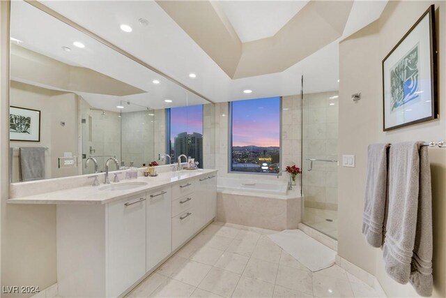 bathroom with separate shower and tub, tile patterned floors, and vanity