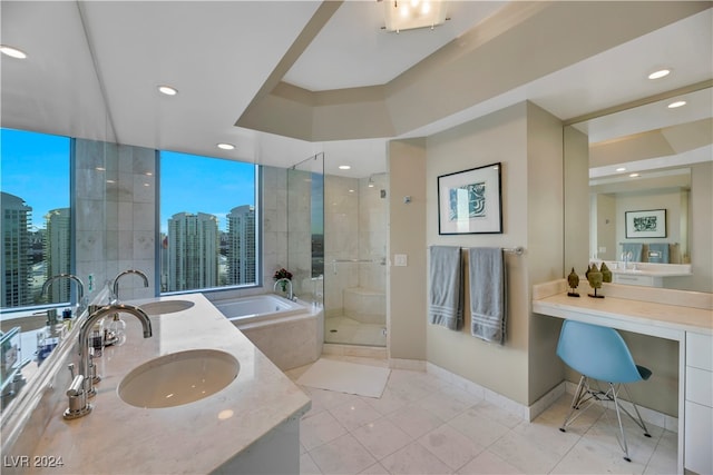 bathroom with separate shower and tub, tile patterned flooring, and vanity