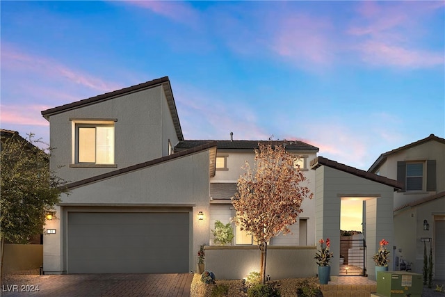 view of front of home with a garage