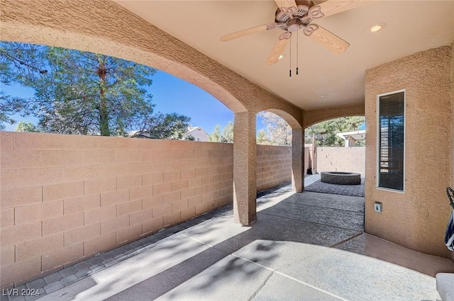 view of patio / terrace with a fenced backyard and a ceiling fan