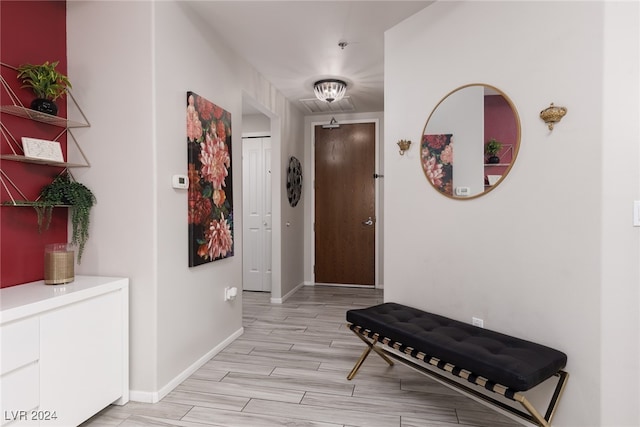 hallway featuring light hardwood / wood-style flooring