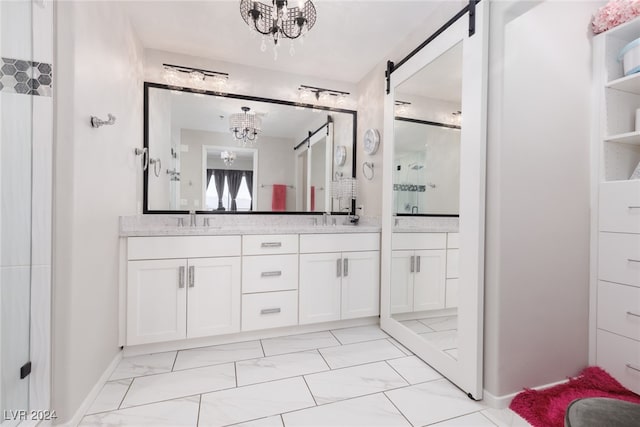 bathroom with a shower, vanity, and a notable chandelier